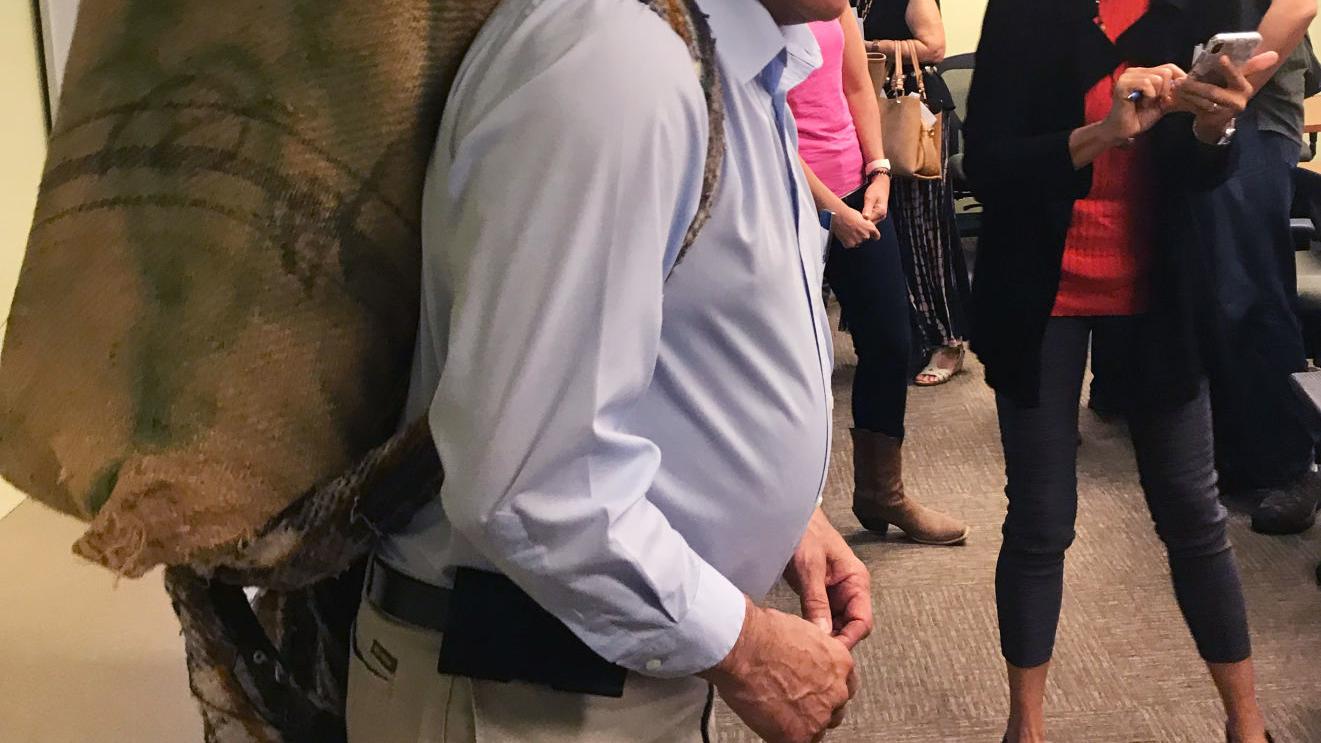 Iowa Rep. Steve King goes to Bisbee, models burlap-wrapped marijuana backpack
